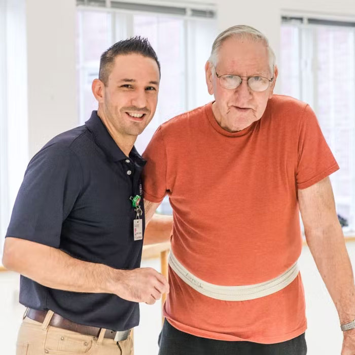 physical therapist working with Hillebrand Nursing and Rehabilitation resident
